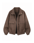 Brown suede-look oversized jacket with a snap-fastened point collar, two flap pockets and a two-way zip, shown open from the front