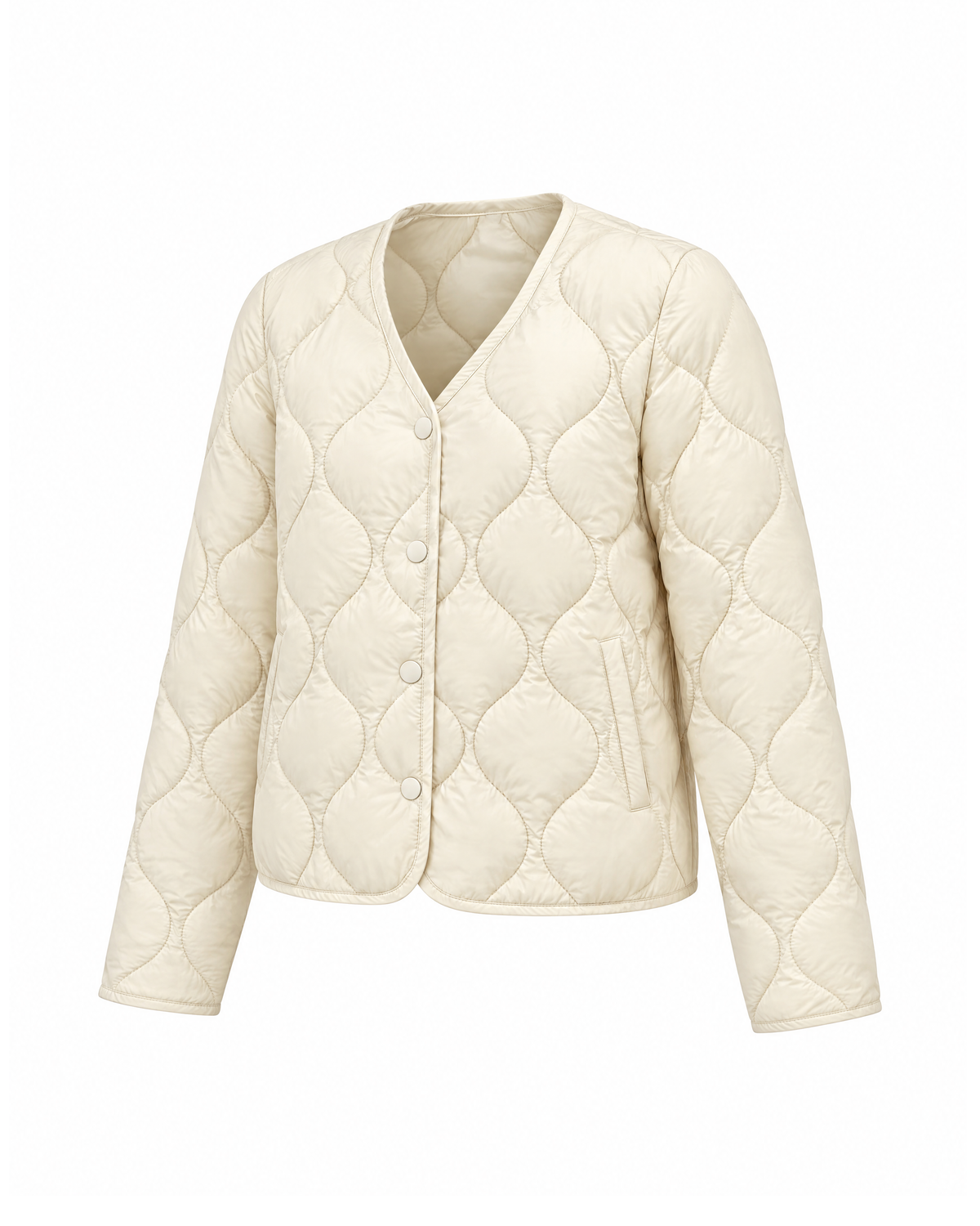 Cropped quilted jacket in Ivory from a front three-quarter angle, showing the side, the welt pocket and the plain cuff