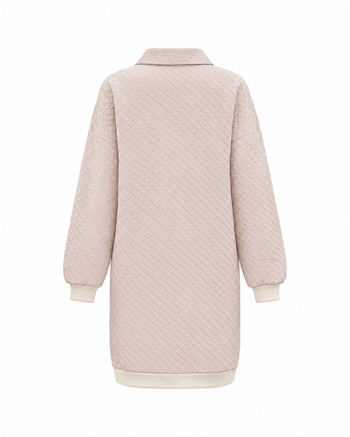 Beige quilted sweatshirt dress with a polo collar, back view of the diamond quilting and cream rib hem