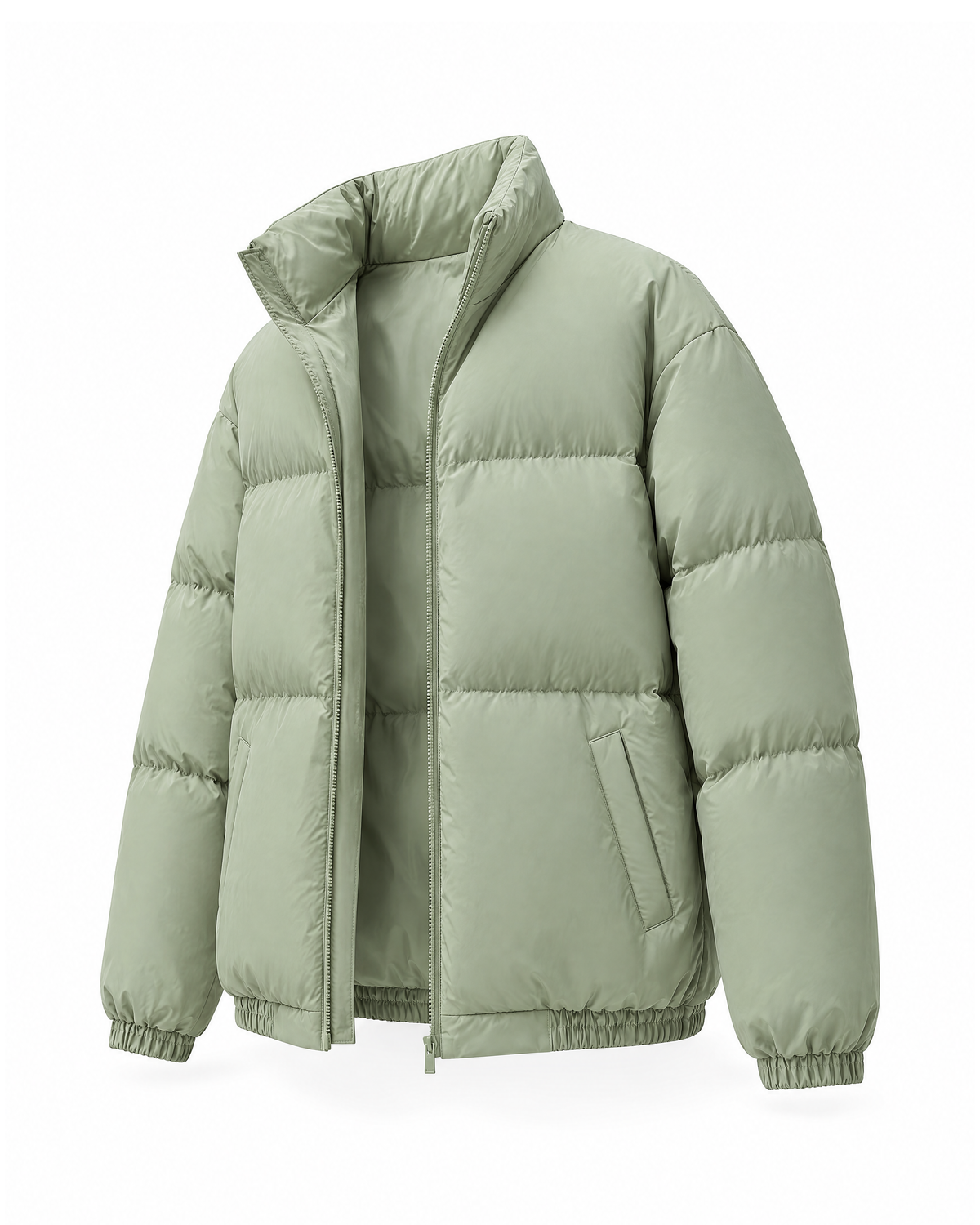 Sage Green men's puffer jacket at a front three-quarter angle, showing the welt hip pocket, the quilted bands and the elasticated cuff