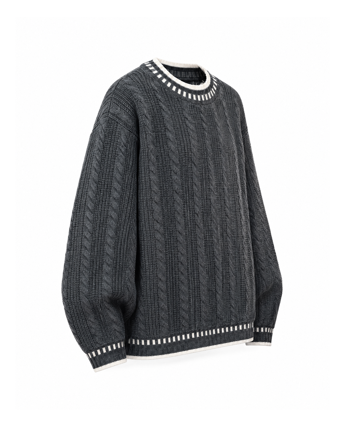 Oversized cable knit sweater with dash stitch trim in Dark Grey, three-quarter view showing the dropped shoulder, full sleeve and trimmed cuff